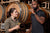 Intercept Winemaker Amanda Gorter and Charles Woodson sampling Chardonnay from barrels. Photo by Christina Schmidhofer.